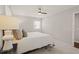 Bedroom with a neutral color scheme, carpet floor and a ceiling fan at 5913 North Hills Dr, Raleigh, NC 27609