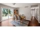 Dining room area featuring a wooden table and chairs, and access to the deck at 5913 North Hills Dr, Raleigh, NC 27609