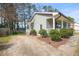 Exterior view of the gray home featuring a fenced yard at 5913 North Hills Dr, Raleigh, NC 27609