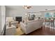 Open-concept living room flowing into the kitchen and dining area at 5913 North Hills Dr, Raleigh, NC 27609