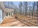 Large back deck offers great space for entertaining with access to the backyard at 6021 Dickson Mill Rd, Durham, NC 27705