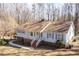 Well-maintained home with a welcoming front porch and neat landscaping at 6021 Dickson Mill Rd, Durham, NC 27705