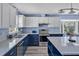 Stylish kitchen with stainless steel appliances, custom cabinetry, and a bright, inviting atmosphere at 6021 Dickson Mill Rd, Durham, NC 27705