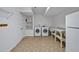 Bright laundry room features a washer and dryer and utility sink with a built-in table at 6021 Dickson Mill Rd, Durham, NC 27705