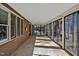 Spacious sunroom with glass sliding doors and view of the backyard at 6021 Dickson Mill Rd, Durham, NC 27705