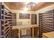Unique wine cellar with wood shelving and ornate accents at 6021 Dickson Mill Rd, Durham, NC 27705