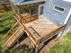 Elevated wooden deck with railings, offering outdoor living space at 608 Dowd St, Durham, NC 27701