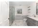 Beautiful bathroom with walk-in shower, marble floors, and stylish vanity at 636 Palmer Dr, Sanford, NC 27330
