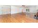 Expansive living room featuring hardwood floors, fireplace, and an abundance of natural light at 636 Palmer Dr, Sanford, NC 27330