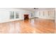 Spacious living room with hardwood floors, fireplace, and built-in shelving at 636 Palmer Dr, Sanford, NC 27330