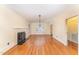 Spacious living room featuring hardwood floors, a fireplace, and bright natural light at 636 Palmer Dr, Sanford, NC 27330