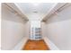 Large walk-in closet with built-in shelving and ample storage space at 636 Palmer Dr, Sanford, NC 27330