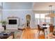 Spacious living area with a tv, a comfortable chair, and an open dining area at 705 Highgrove Dr, Chapel Hill, NC 27516