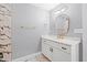 Stylish bathroom with elegant fixtures and a sleek white vanity at 707 Memorial Ave, Dunn, NC 28334