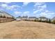 Expansive backyard with fencing and outbuilding, ideal for recreation and relaxation at 708 Pitchback Mill Ct Ct, Wake Forest, NC 27587