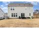 Spacious backyard with a patio area perfect for outdoor seating and entertaining at 708 Pitchback Mill Ct Ct, Wake Forest, NC 27587