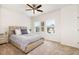 Comfortable bedroom with neutral tones, plush bedding, and natural light from the double windows at 708 Pitchback Mill Ct Ct, Wake Forest, NC 27587