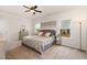 Serene main bedroom with a cozy bed, natural light, and stylish decor at 708 Pitchback Mill Ct Ct, Wake Forest, NC 27587