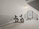 Attic bonus room featuring an exercise bike and a padded exercise mat at 7805 Fairlake Dr, Wake Forest, NC 27587