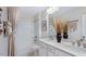 Stylish bathroom featuring double sinks, modern fixtures, and a shower-tub combo with tasteful decorations at 8711 Wardle Ct, Raleigh, NC 27616