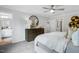 Bright bedroom with comfortable bed, dresser, and en suite bathroom entrance at 8715 Wardle Ct, Raleigh, NC 27616