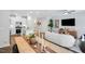 Open-concept living room and kitchen with modern decor and ample natural light at 8715 Wardle Ct, Raleigh, NC 27616
