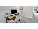 Upstairs office nook featuring neutral walls and carpeting, ideal for a functional home office space at 8715 Wardle Ct, Raleigh, NC 27616