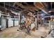 Unfinished basement with washer, dryer, exposed pipes and water heater in need of clean up at 1000 S 9Th St, Lillington, NC 27546