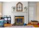 Elegant fireplace with decorative mantle and hearth, creating a cozy focal point in the living room at 1000 S 9Th St, Lillington, NC 27546