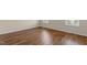 Bedroom with wood-look floors and natural light at 1021 Traditions Meadow Dr, Wake Forest, NC 27587