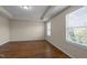 Bedroom with wood-look floors and natural light at 1021 Traditions Meadow Dr, Wake Forest, NC 27587