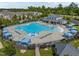 Community pool features a clubhouse, splashpad, and lounge chairs at 1021 Traditions Meadow Dr, Wake Forest, NC 27587