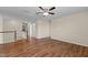 An open loft area with hardwood style floors and a ceiling fan at 1021 Traditions Meadow Dr, Wake Forest, NC 27587