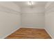 A spacious walk-in closet with installed white wire shelving at 1021 Traditions Meadow Dr, Wake Forest, NC 27587