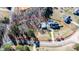 Aerial view outlining the home's generous lot with a pool, workshop, and landscaped yard at 105 Glasgow Dr, Clayton, NC 27520