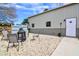 Backyard featuring gravel landscaping, mature trees and a fire pit at 105 Glasgow Dr, Clayton, NC 27520
