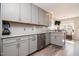 Updated kitchen with stainless steel appliances and modern cabinets at 105 Glasgow Dr, Clayton, NC 27520