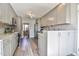 Spacious kitchen featuring stainless steel appliances and light grey cabinets at 105 Glasgow Dr, Clayton, NC 27520