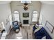 Open living room with fireplace, high ceilings, and lots of light at 105 Glasgow Dr, Clayton, NC 27520