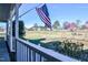 Enjoy a relaxing view of the expansive yard from the cozy front porch at 105 Glasgow Dr, Clayton, NC 27520