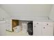 Storage area with built-in cabinets and counter space and room for laundry baskets at 105 Glasgow Dr, Clayton, NC 27520