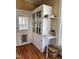 Charming kitchen cabinets with glass door fronts and convenient exterior door at 108 Holt St, Hillsborough, NC 27278