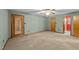 Bright bedroom with a ceiling fan, soft carpet, and natural light from the window at 1117 Pine Trl, Clayton, NC 27520