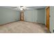 Bedroom with a ceiling fan, soft carpet, and plenty of outlets at 1117 Pine Trl, Clayton, NC 27520