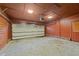The garage features painted walls and ceiling, and a door for interior access at 1117 Pine Trl, Clayton, NC 27520