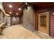 Screened-in porch with brick, a ceiling fan, wooden ceiling, and access to the backyard at 1117 Pine Trl, Clayton, NC 27520