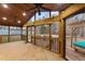 Large screened-in porch with natural lighting and wooden ceiling at 1117 Pine Trl, Clayton, NC 27520
