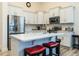 Bright, well-equipped kitchen with stainless steel appliances and a functional center island at 119 Whitley Ridge Dr, Clayton, NC 27527