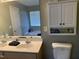 Bathroom featuring a double sink vanity and a tub at 1208 Shining Water Ln, Creedmoor, NC 27522