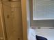 Bathroom featuring a bathtub, shower, and large window with blinds at 1208 Shining Water Ln, Creedmoor, NC 27522